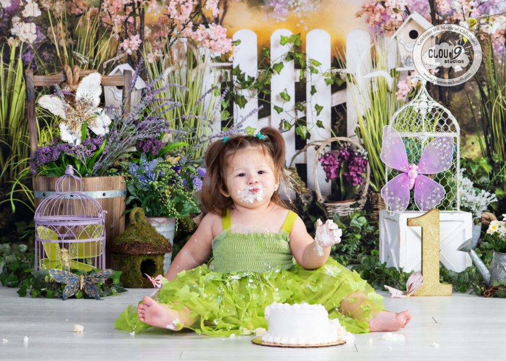 First birthday photo of baby in studio with smash cake – Cloud 9 Studios in Wesley Chapel