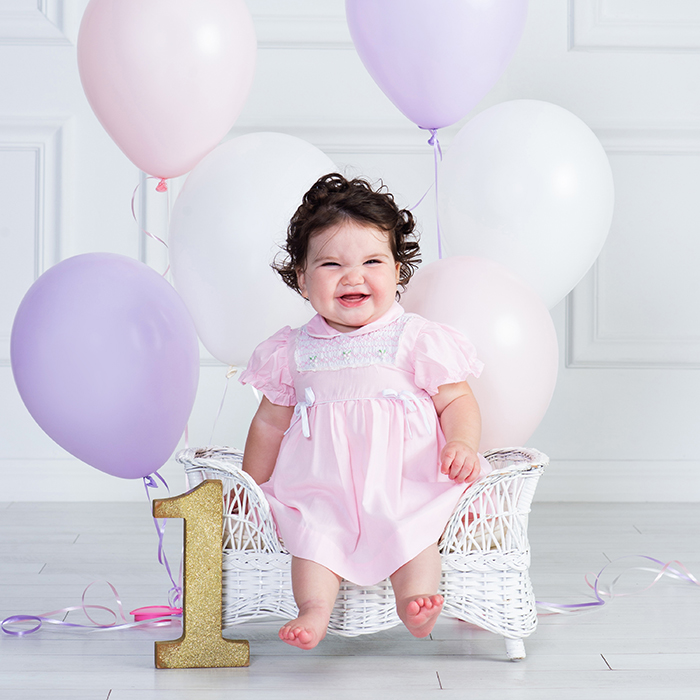 baby first birthday milestone portrait