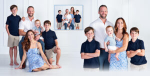 Smiling family hugging during first birthday portrait session at Cloud 9 Studios in Wesley Chapel, Tampa Bay Area — showing connection and belonging.