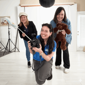 Jeanine McLeod and the team at Cloud 9 Studios acting silly to make children smile and feel comfortable in the studio for their portrait sessions in Wesley Chapel, Florida just north of Tampa.