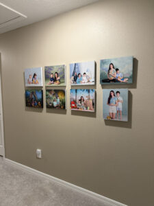 Eight years of annual duck portraits displayed as canvases in a hallway at photographer Jeanine McLeod's Wesley Chapel home