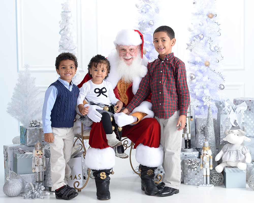 JB visiting Santa during one of his childhood Christmas portrait sessions