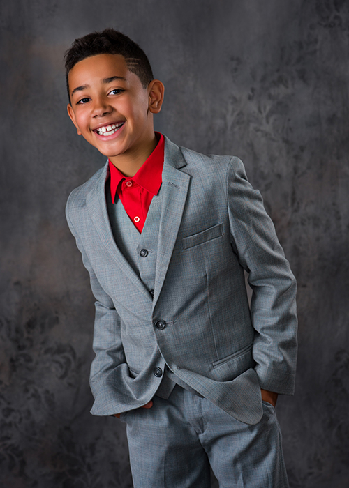 JB celebrating his tenth birthday with a milestone portrait