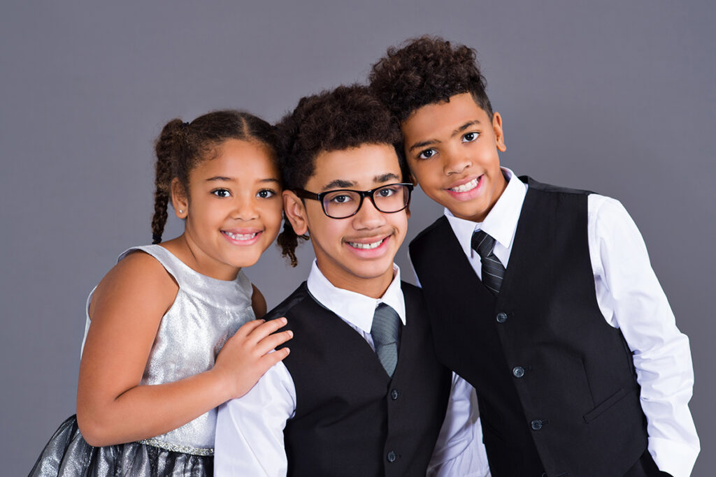 JB with his siblings during a family portrait session at the studio