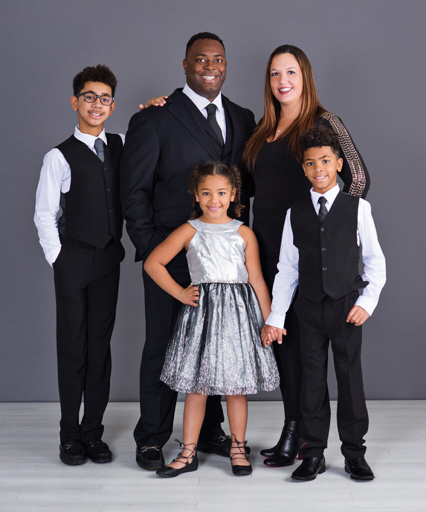The Williams family together during a family portrait session