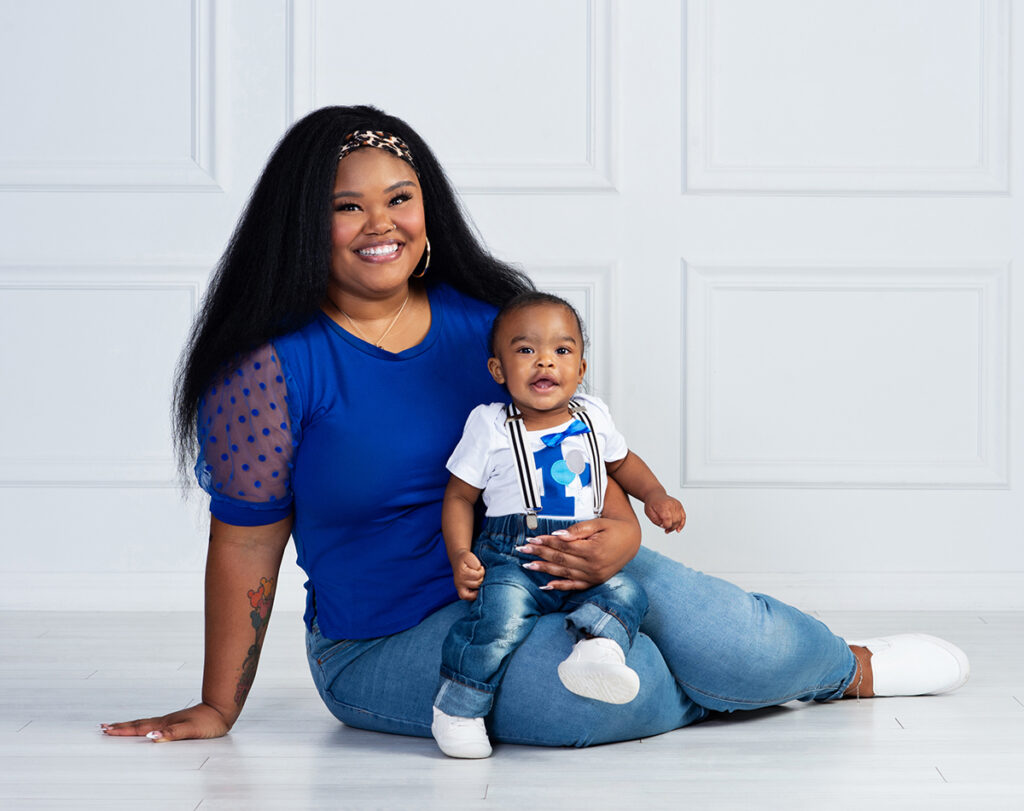 Mom and her son together on his first birthday portrait session at Cloud 9 Studios in Wesley Chapel, Florida