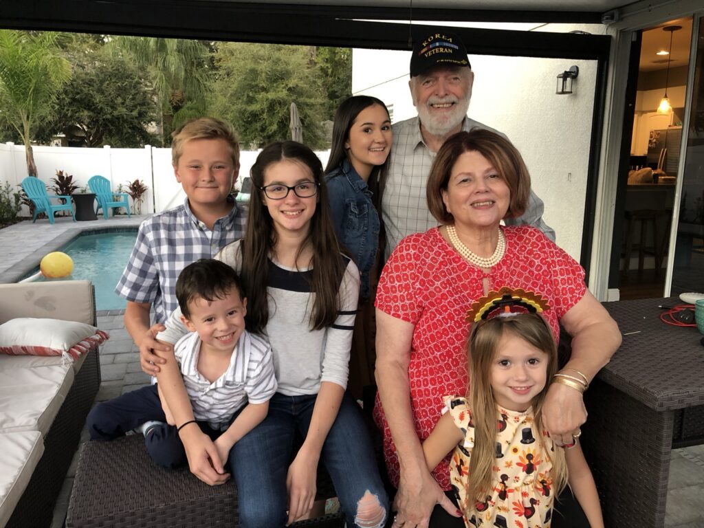 Jeanine's parents with their grandchildren during Thanksgiving 2019, their last photograph together with all the grandkids.